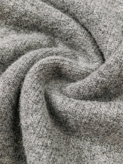 Close up of the extrafine merino wool knit in grey marl