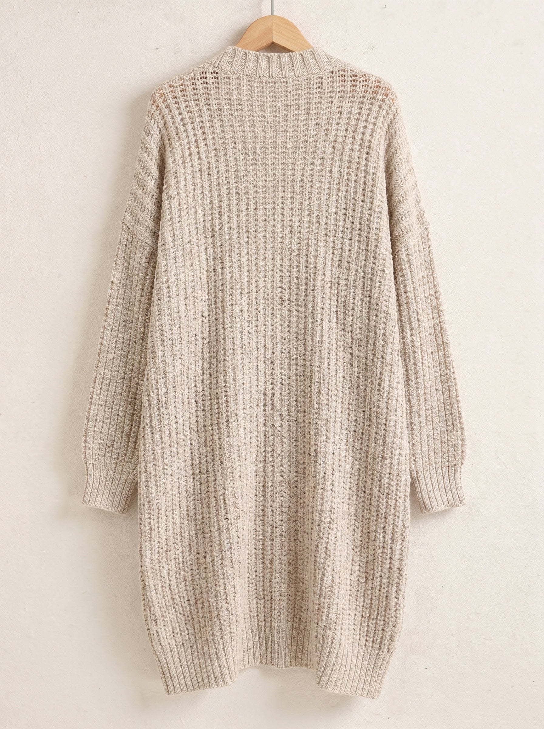 Oatmeal longline open front chunky rib cardigan on a hanger