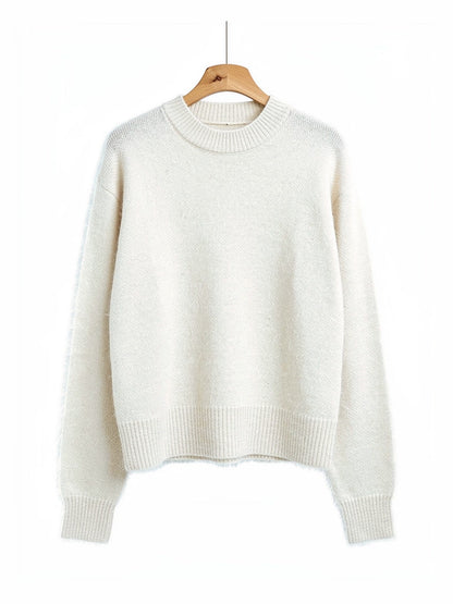 Thistledown oversized crew neck jumper on a hanger, front view