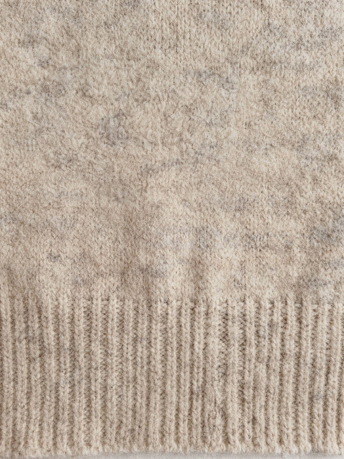 Close up of the brushed marled knit and the deep ribbing of the Kempsford oversized jumper