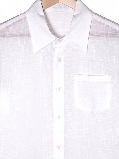 Collar, button placket and chest pocket detail of the white oversized slub weave shirt