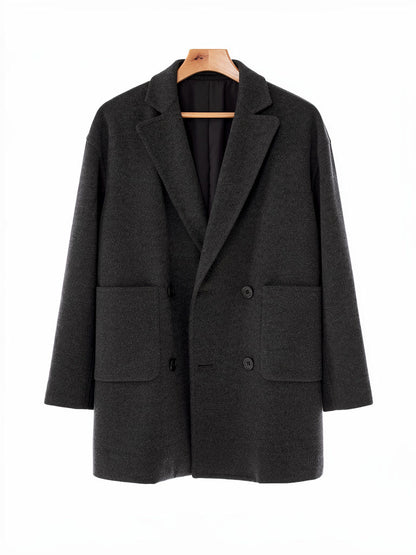 Double breasted wool pea coat in Graphite charcoal on a hanger, front view