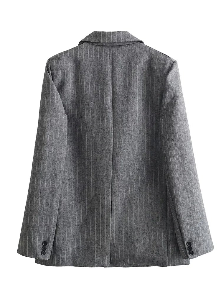 Back view of the grey pinstripe blazer showing the centre vent