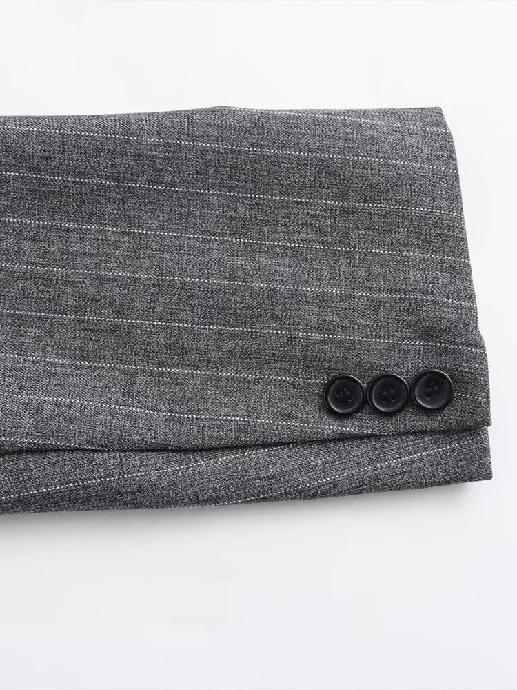 Cuff of the pinstripe blazer with three buttons