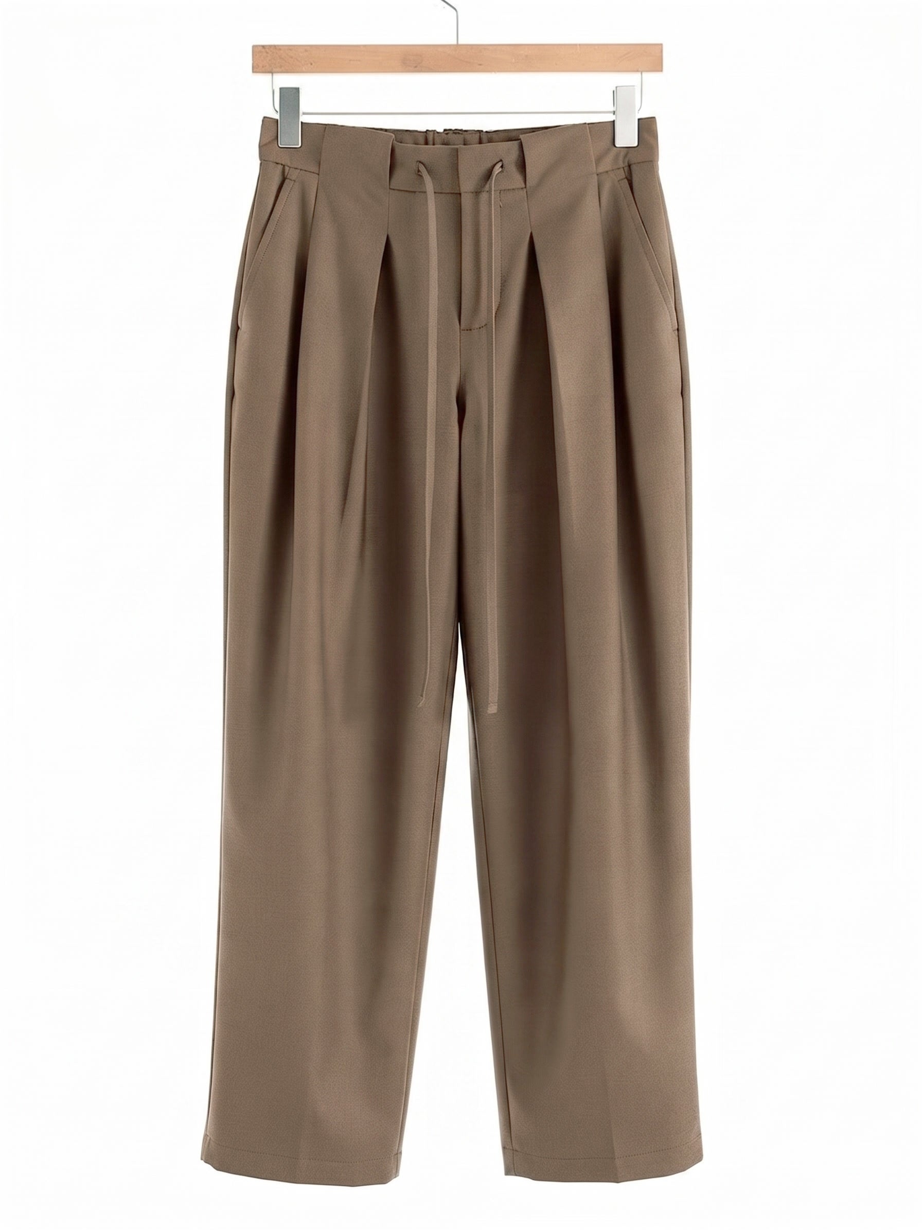 Nutmeg pleated trousers on a hanger, front view