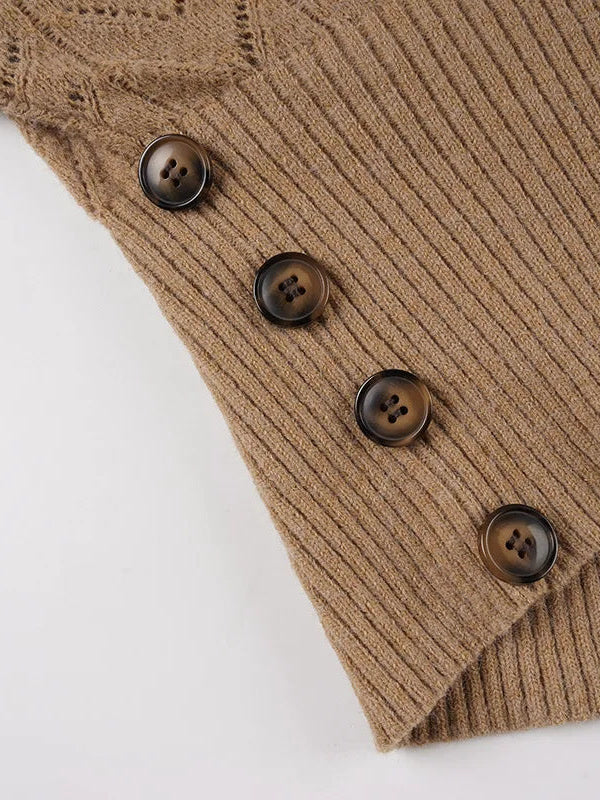 Tortoiseshell-style buttons on the ribbed waistband of the pointelle roll neck jumper