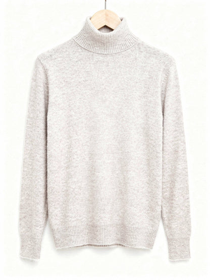 Limewash polo neck jumper on a hanger, fine brushed knit with a tall folded roll neck and deep ribbed cuffs