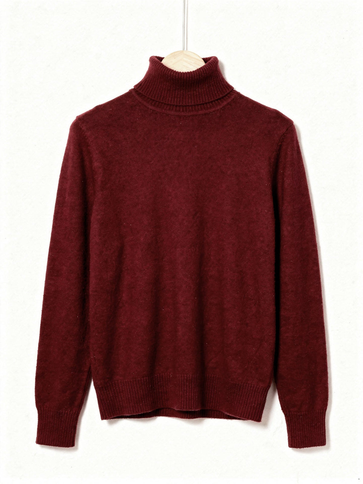 Madder polo neck jumper on a hanger, fine brushed knit with a tall folded roll neck and deep ribbed cuffs