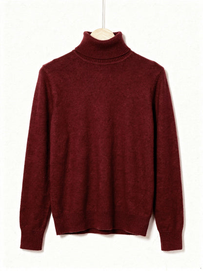Madder polo neck jumper on a hanger, fine brushed knit with a tall folded roll neck and deep ribbed cuffs