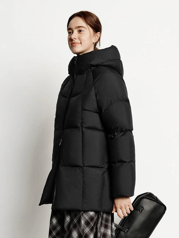 Puffer jacket in Jet Black, side view showing the padded hood