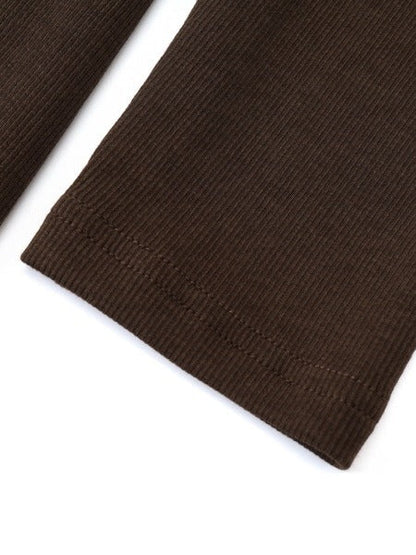 Sleeve and plain ribbed cuff of the ribbed maxi dress in Dark Chocolate