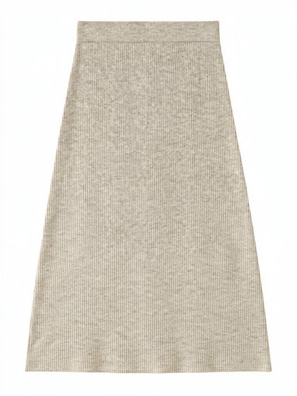 Ribbed midi skirt in porridge oatmeal, hung flat to show the plain ribbed waistband, the fine vertical rib and the wide level hem