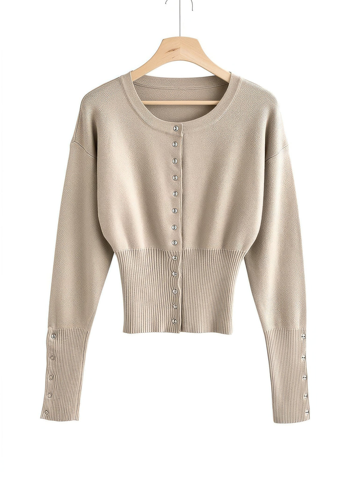 Cropped round-neck cardigan in Wheat on a hanger, ribbed waist panel and silver press studs