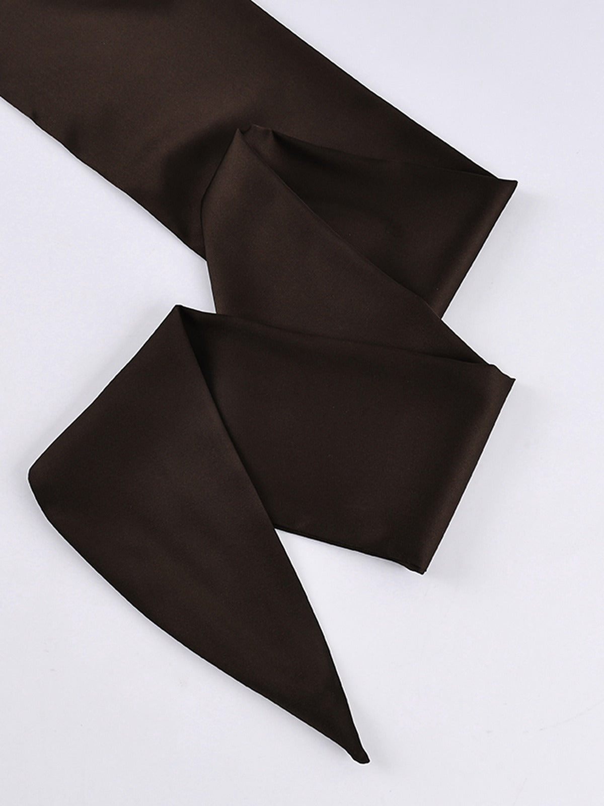 The separate satin tie sash that comes with the blouse
