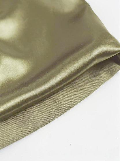 Close up of the satin weave, lustrous face and matte reverse at the hem