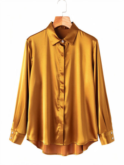 Amber satin shirt with a concealed placket, front view on a hanger