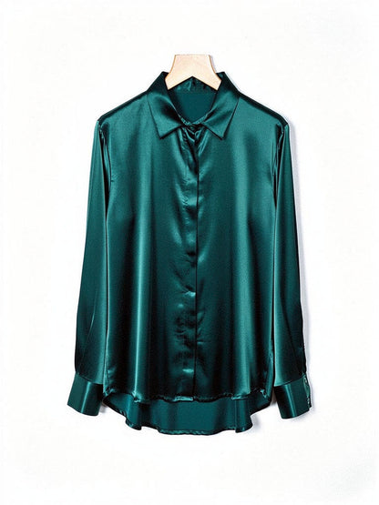 Peacock teal satin shirt with a concealed placket, front view on a hanger