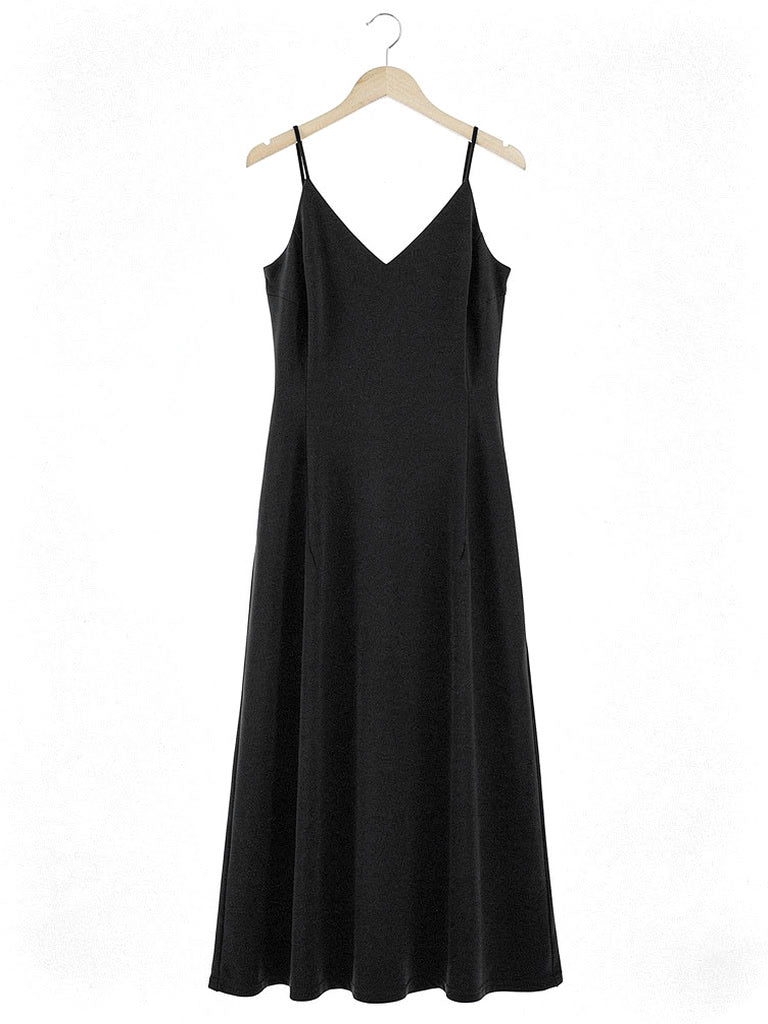 Black slip dress on a wooden hanger, strappy V neck A line maxi, front view