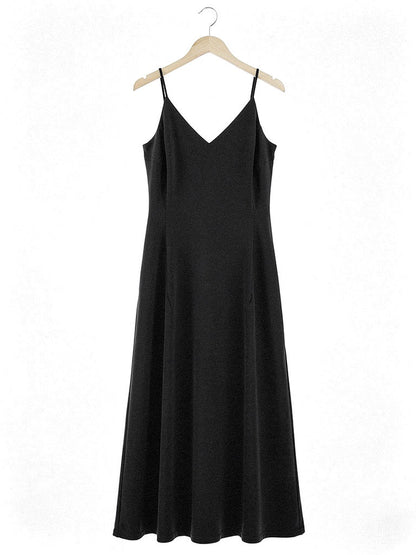 Black slip dress on a wooden hanger, strappy V neck A line maxi, front view