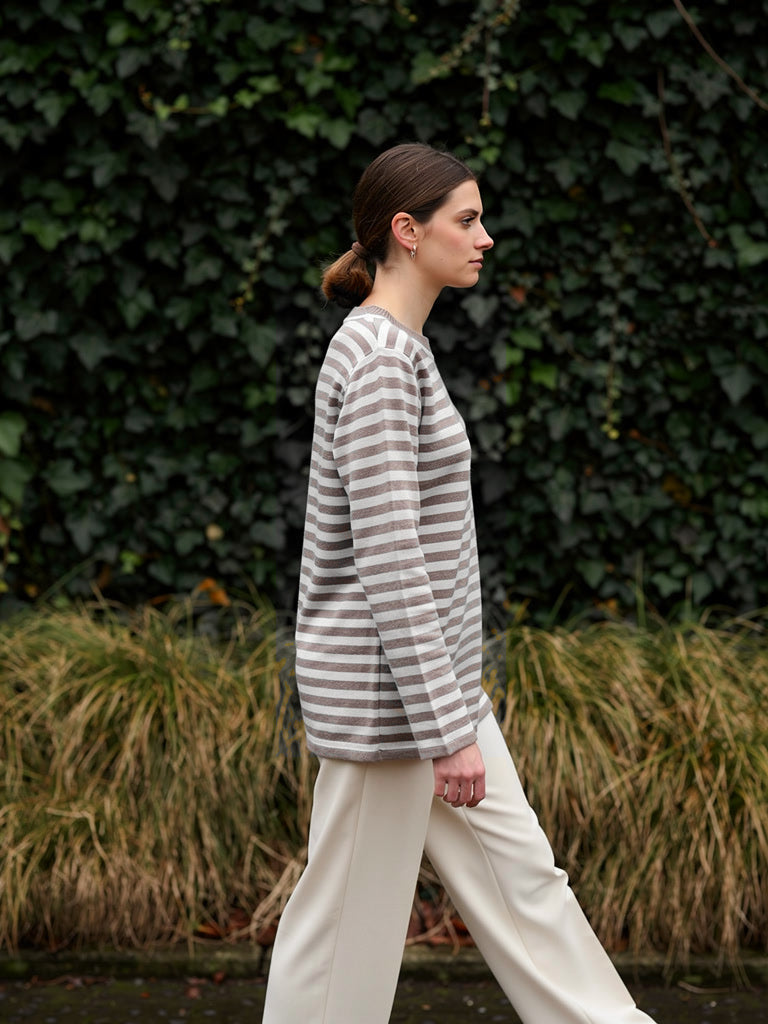 Striped jumper worn in Fossil greige breton knit, side view