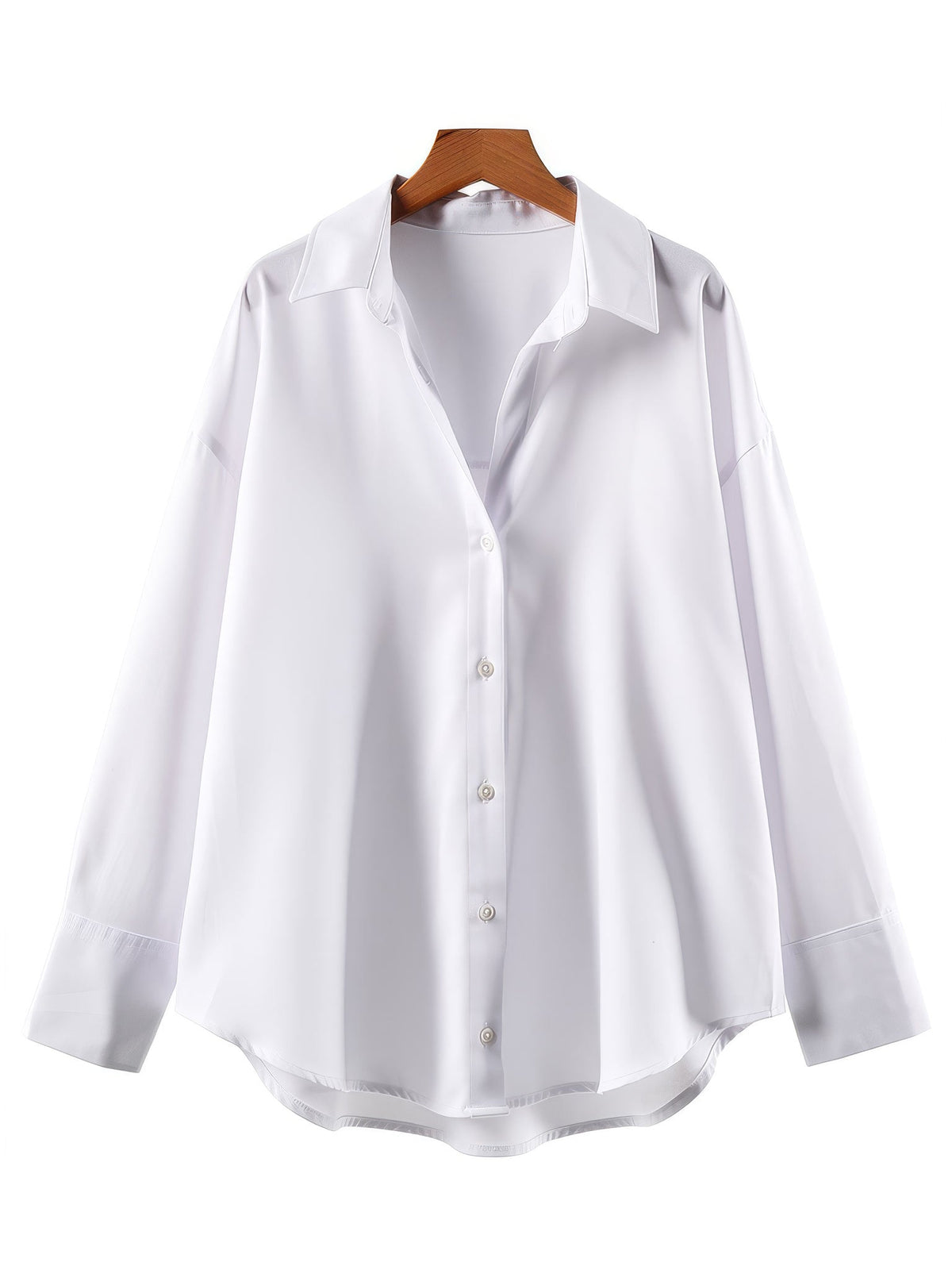 Oversized shirt in bright white on a hanger, front view