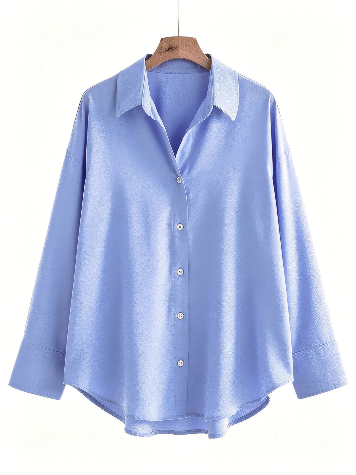 Oversized shirt in harebell blue on a hanger, front view