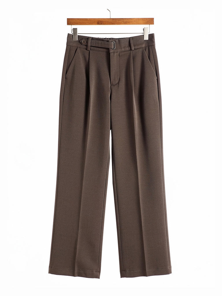 Tailored trousers in Muscovado brushed twill shown in full on a wooden hanger