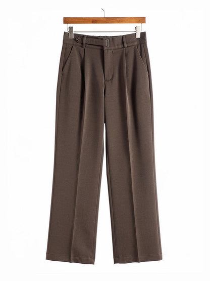 Tailored trousers in Muscovado brushed twill shown in full on a wooden hanger
