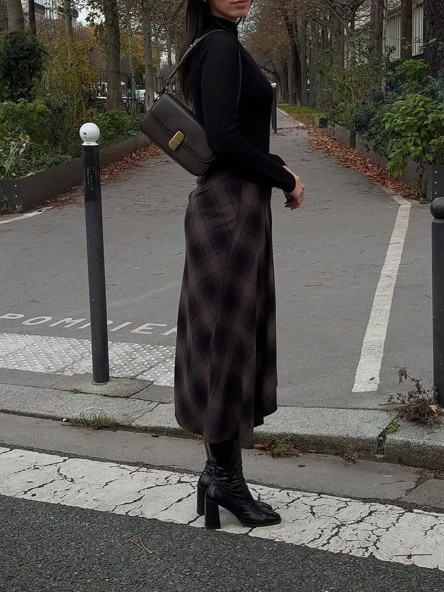 Tartan midi skirt seen from the side, supplier photograph, worn with black boots
