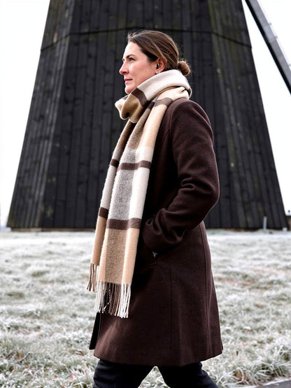 Brushed wool tartan scarf in Fawn Check worn looped over a dark brown winter coat