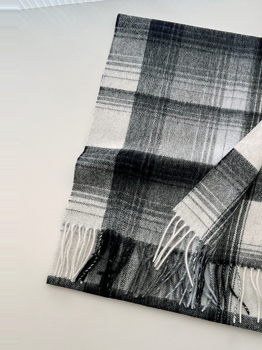 Brushed wool tartan scarf in Flint Check shown flat with its twisted tassels