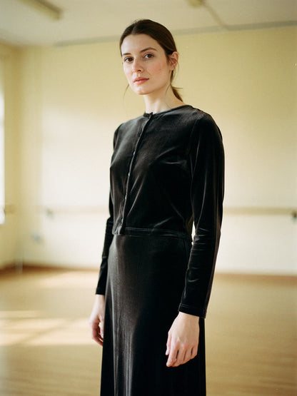 Velvet co-ord in Black, cropped velvet cardigan worn over the midi dress