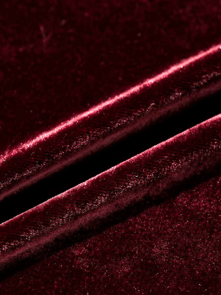 Close-up of the short dense wine velvet pile of the Westcote co-ord