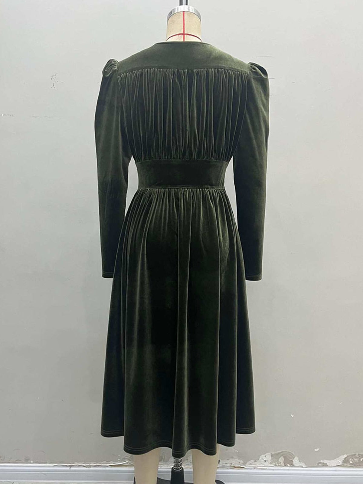 Back of the velvet midi dress showing the plain yoke and the gathered upper back