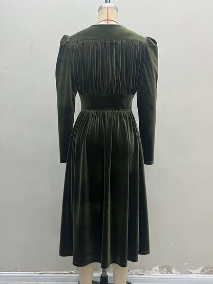 Back of the velvet midi dress showing the plain yoke and the gathered upper back