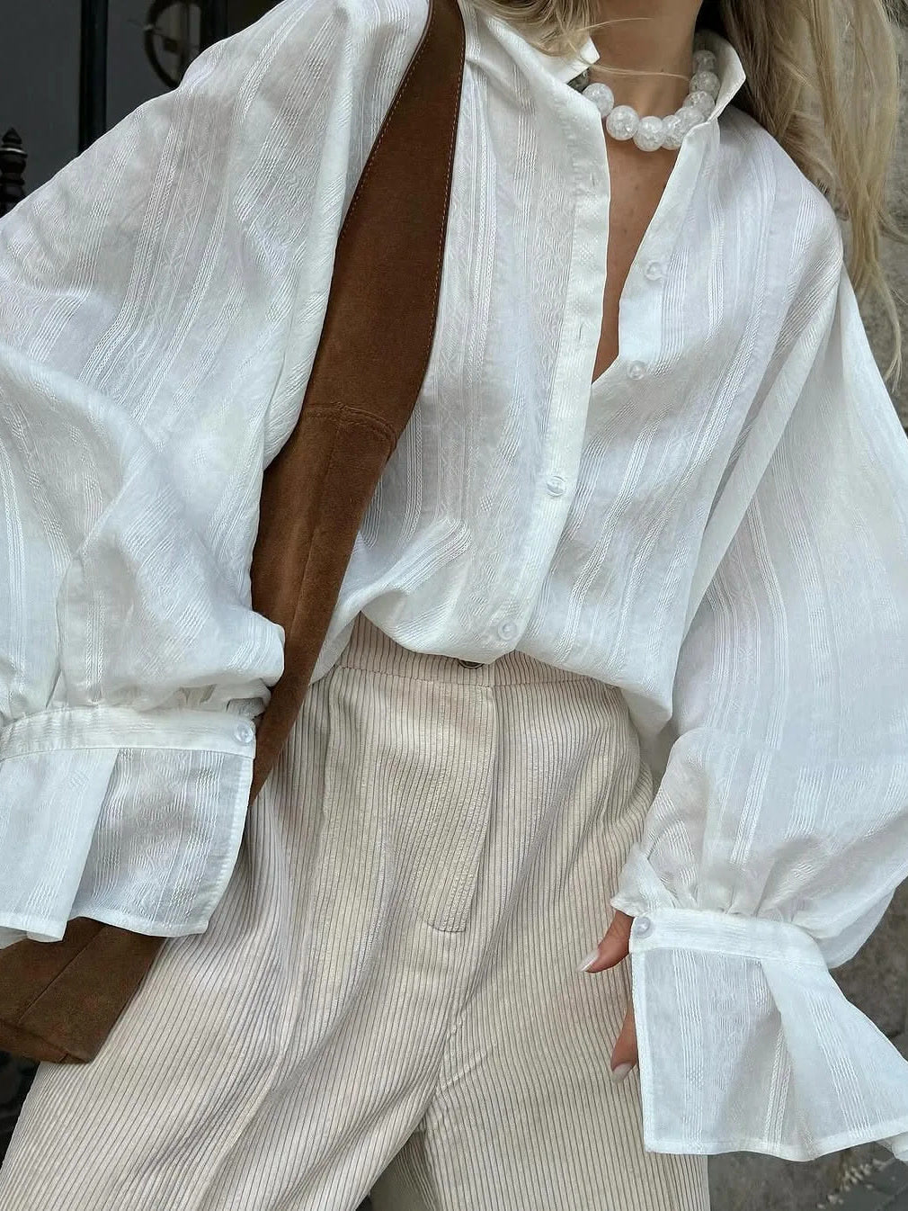 Deep buttoned cuffs and self-stripe voile fabric detail, white tunic shirt