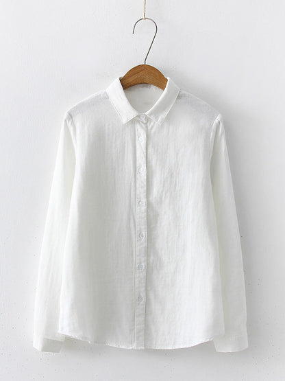 Salt White cotton shirt photographed on a wooden hanger