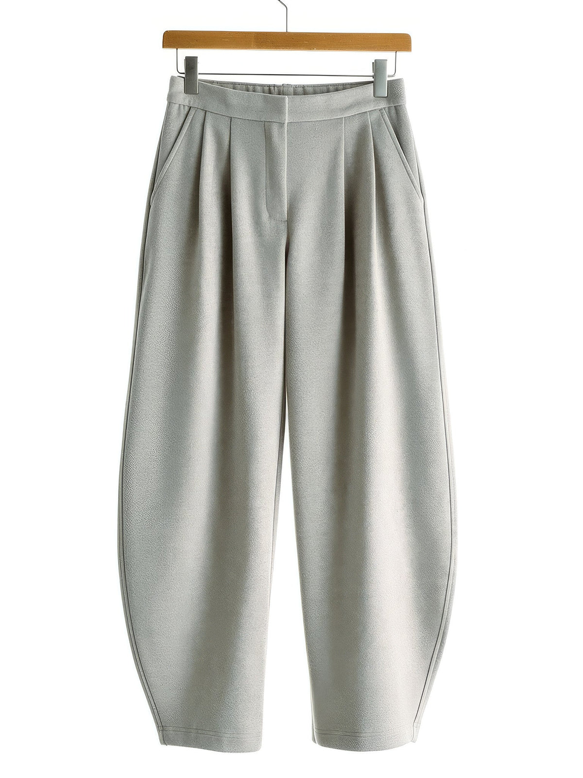 Putty wide-leg trousers with a curved barrel leg on a wooden hanger, front view