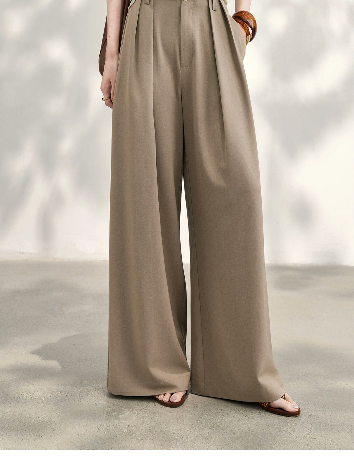 Winsley high-rise wide-leg trousers in taupe, full length front view