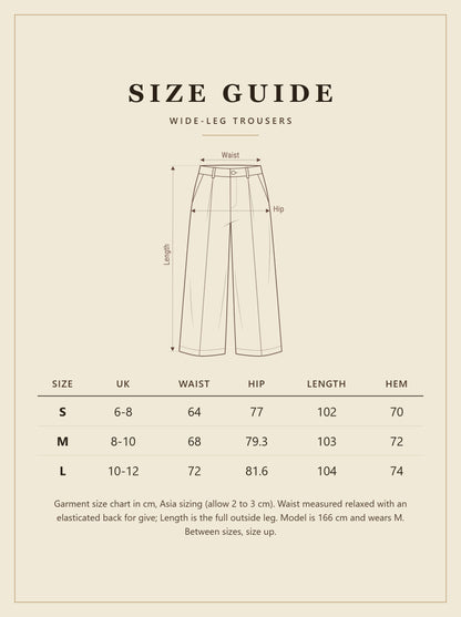 Winsley wide-leg trousers size guide with waist, hip, length and hem measurements in cm