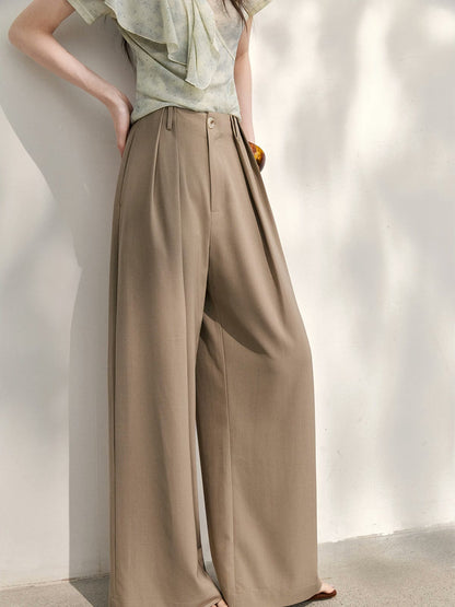 Close-up of the elasticated back waistband of the Winsley wide-leg trousers in taupe