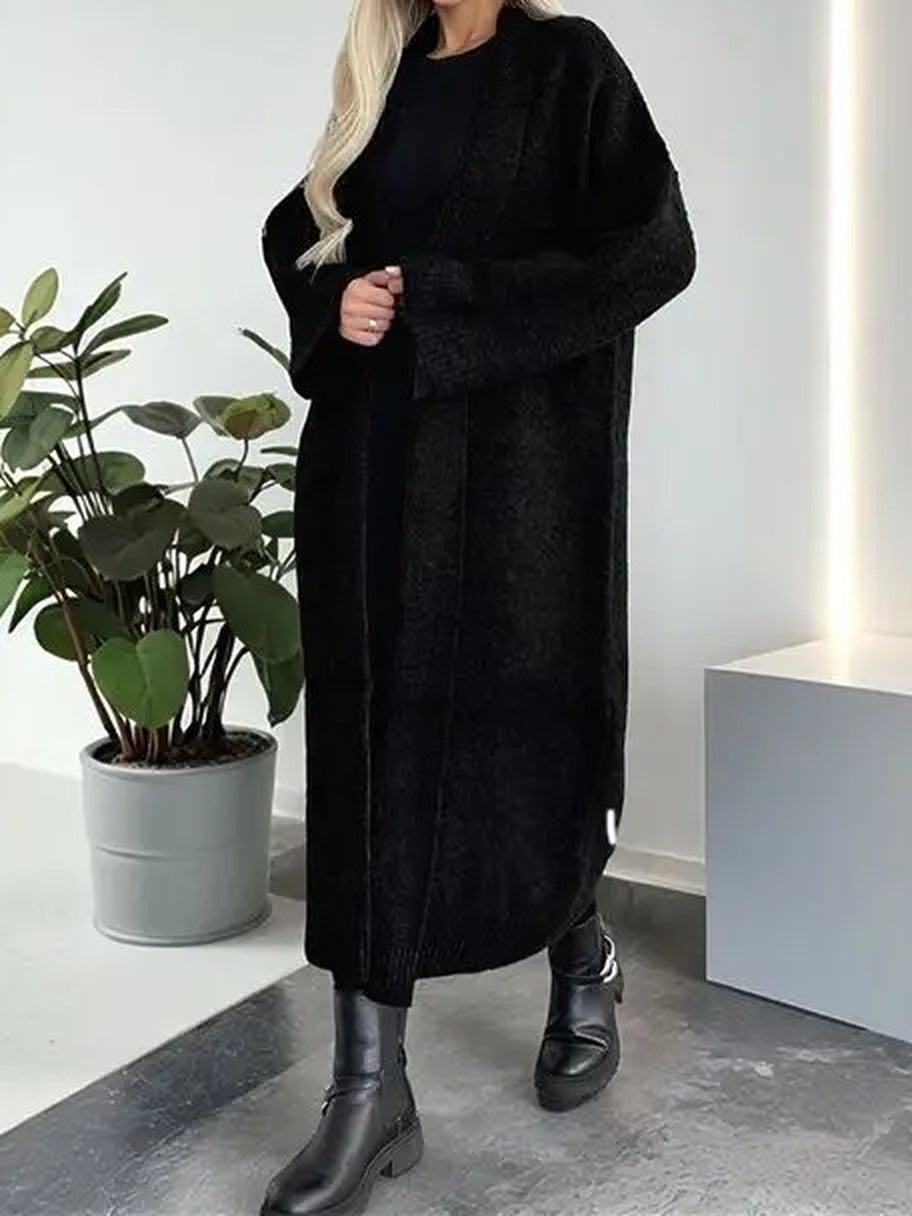 Womens black chunky knit coatigan worn open, full length