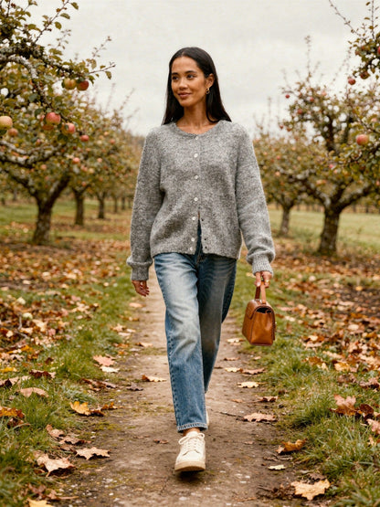 Womens grey marl button-through cardigan in brushed knit worn in an English orchard