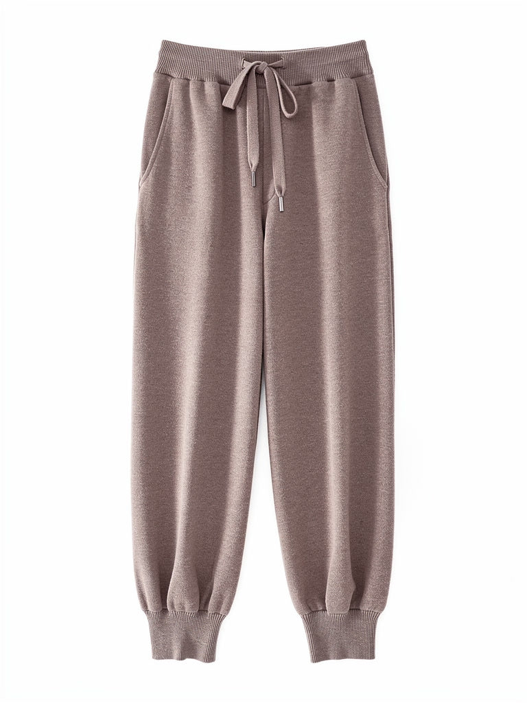 Womens knitted merino wool trousers in Mushroom, laid flat
