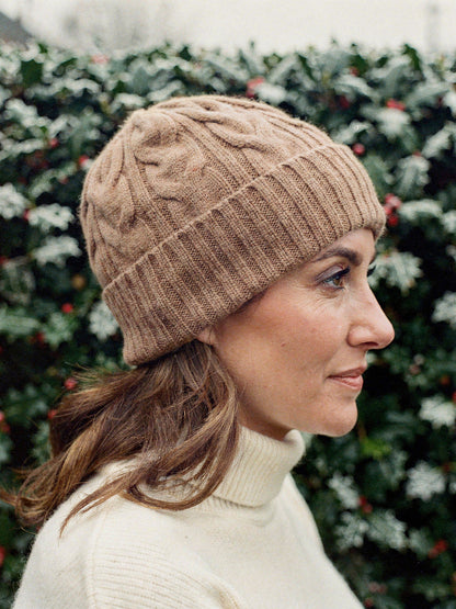 Fallow wool hat seen in profile, showing the depth of the turn up ribbed cuff