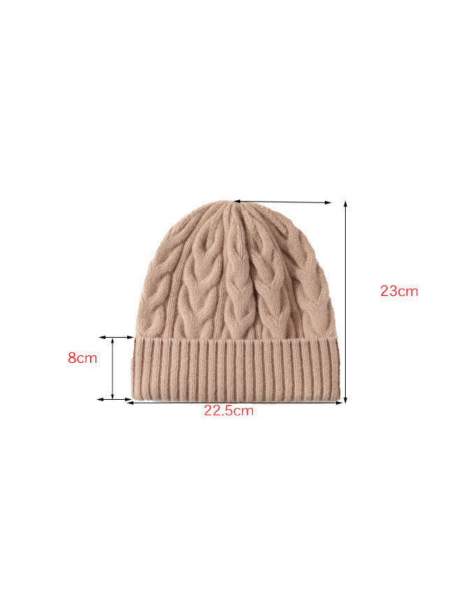 Measurements of the wool hat, 23 cm tall, 22.5 cm across and an 8 cm turn up