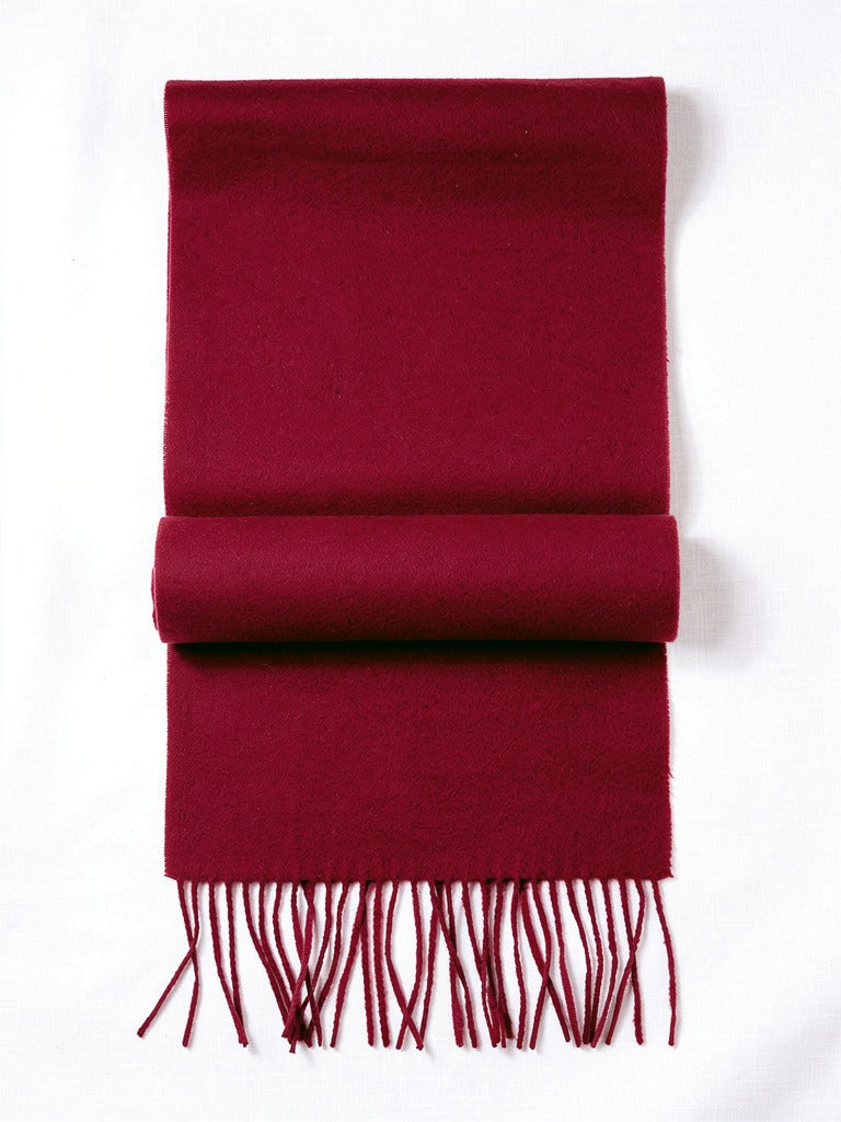 Bordeaux wool pashmina shawl folded flat, deep wine red brushed wool with twisted tassels