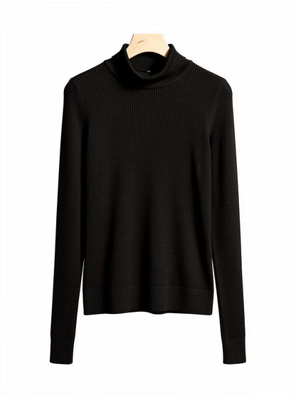 Black wool roll neck jumper on a hanger, fine rib knit with a folded roll neck and ribbed hem