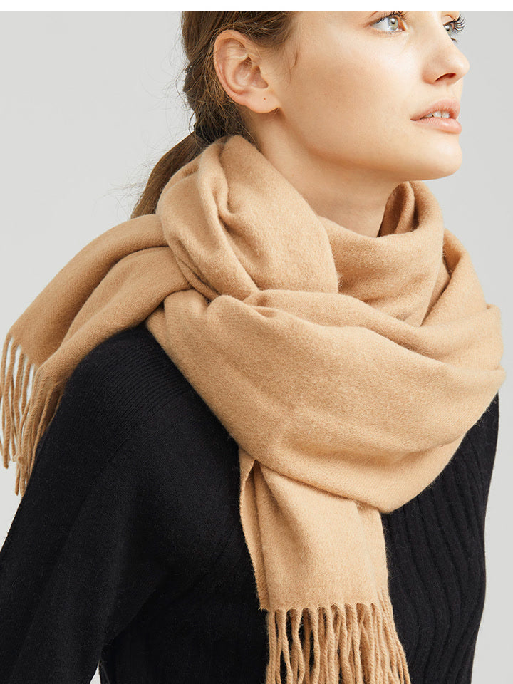 Womens wool scarf in Honey worn looped at the neck over a black roll neck