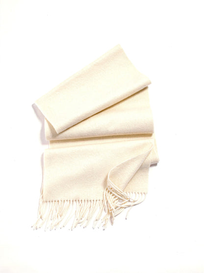Womens wool scarf in Meadowsweet folded flat, 200cm of brushed wool with a twisted fringe